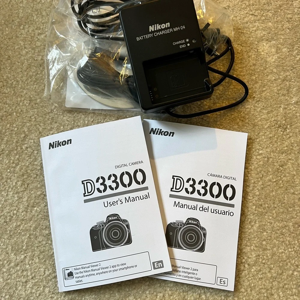 Nikon D3300 DSLR Camera with 1855mm VR II and 55200mm VR II Lenses Red and case